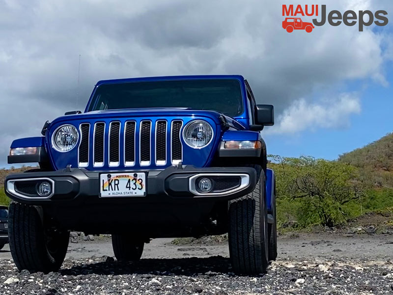 Blue Jeep on the beach on Maui