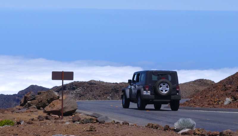 Jeep driving on the road to Haleakala